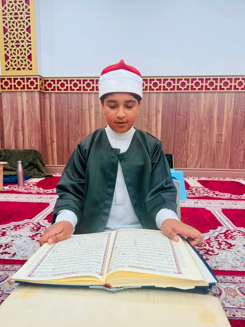 Student reciting the Quran at Masjid Al Salam